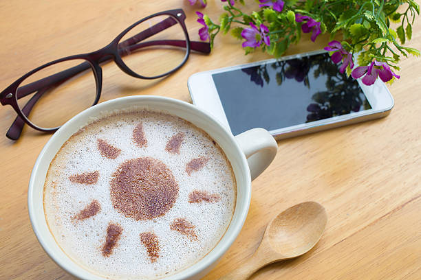 istock latte art coffee with sun design in white cup 540362030