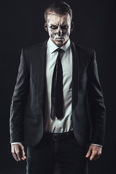 istock Portrait serious businessman  makeup skeleton 540365182