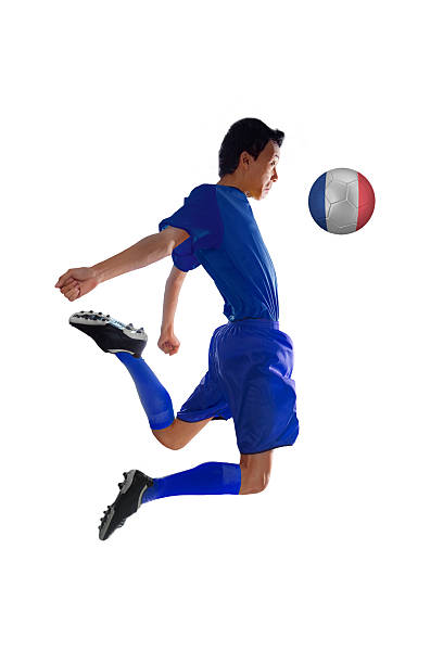 istock Football player playing a ball in studio 540365188