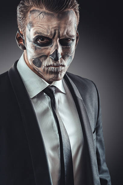 istock Portrait serious businessman  makeup skeleton 540365320