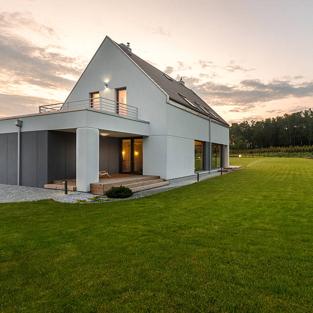 istock House with wide green lawn 540366782