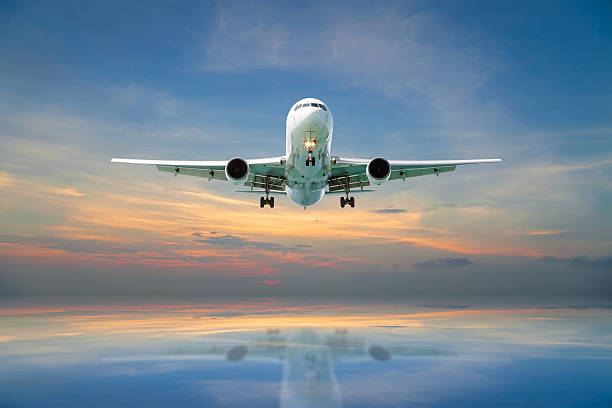 istock Airplane flying tropical sea at sunset time. 540367772