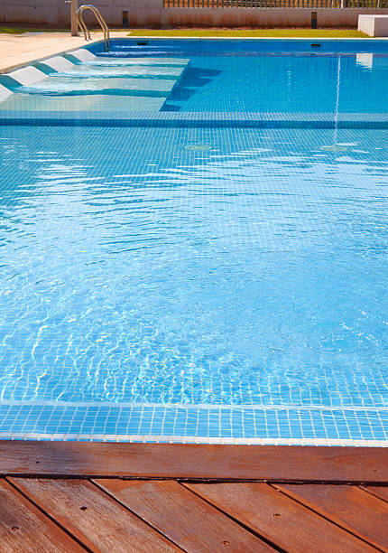 istock part of swimming pool with blue water 540372828