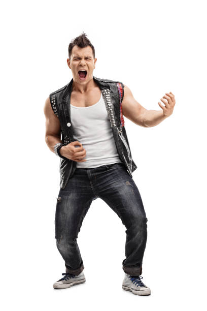 istock Young punk rocker playing an air guitar 540374506