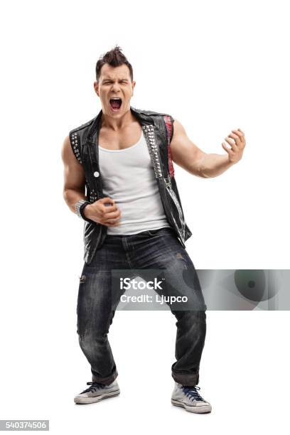 Young Punk Rocker Playing An Air Guitar Stock Photo - Download Image Now - Air Guitar, Full Length, Cut Out