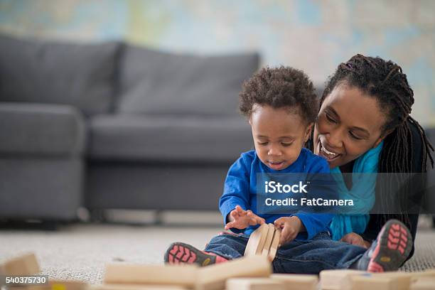 Playing With Wooden Blocks Stock Photo - Download Image Now - Blue, Family, Baby - Human Age