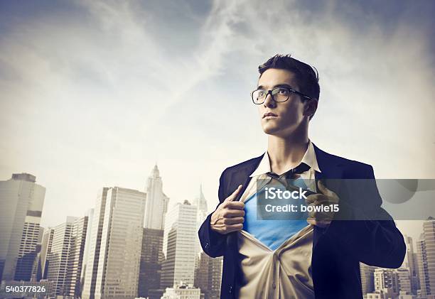 Businessman Ripping Shirt Open In City Stock Photo - Download Image Now - Men, Tearing, Adult