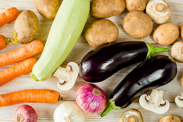 istock Mixed village vegetables on wooden background 540378846