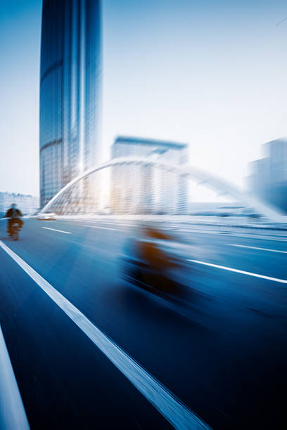 istock motion blurred car at bridge,tianjin city 540379478