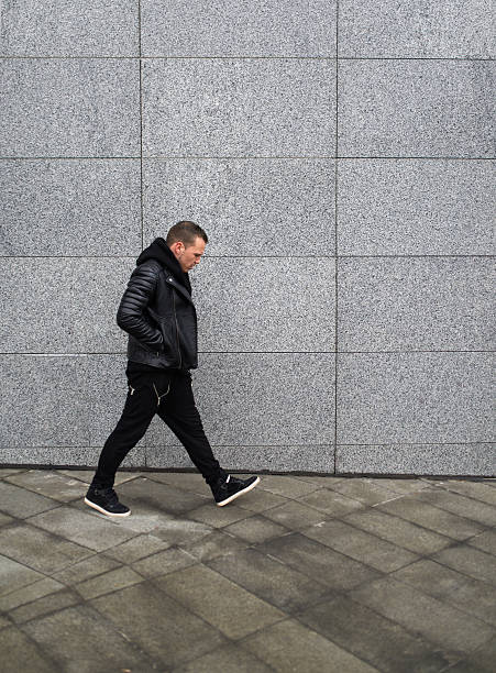 istock frustrated man goes near  wall 540381112
