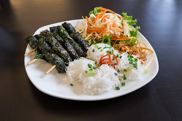 Grilled pork wrapped in betel leaf, Vietnamese cuisine