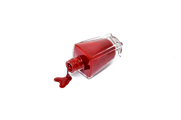istock Red nail polish on white background 540384942