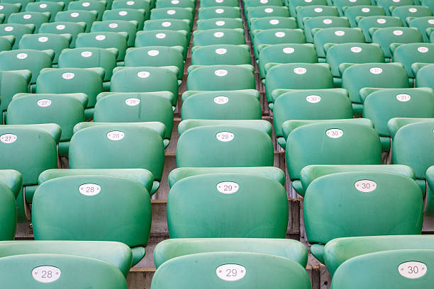 istock Green plastic seats  at modern stadium 540387046