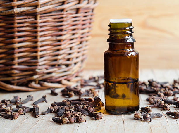 Essential clove oil Essential clove oil clove spice stock pictures, royalty-free photos & images