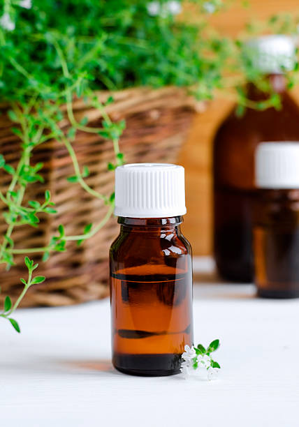 istock Small bottle of essential thyme oil 540389992