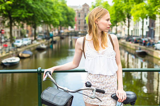 istock Woman with bike 540391968