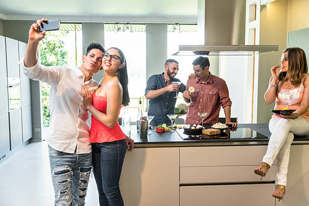 istock group of friends toasting with drinks 540392096
