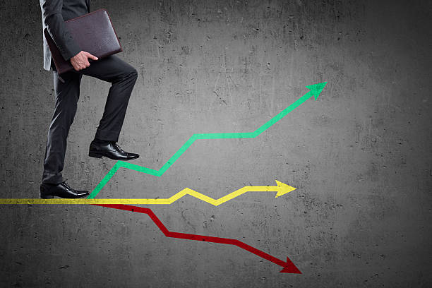 istock Businessman walking up on colorful graph 540392242