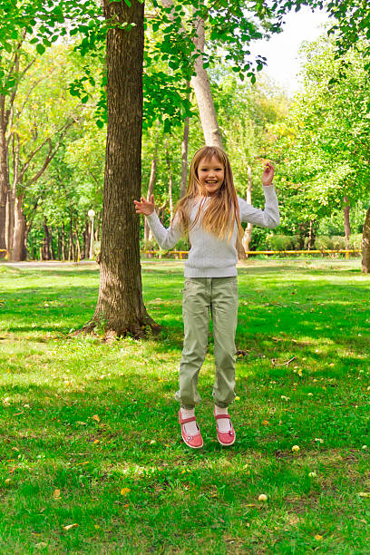 istock Jumping girl in summer 540393628