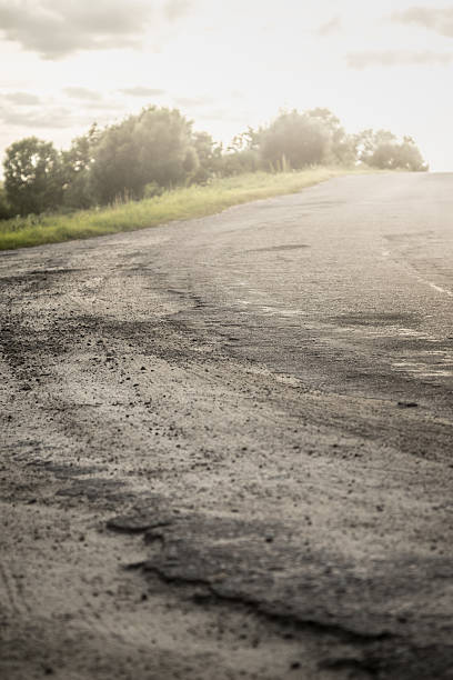 istock Country road going over horizon 540394274