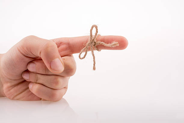 istock Hand tied with a ribbon 540396984