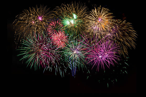 istock Beautiful celebration golden, purple, green sparkling fireworks 540398096