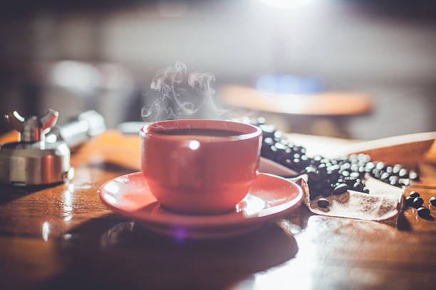 istock hot fresh coffee on desk 540398692