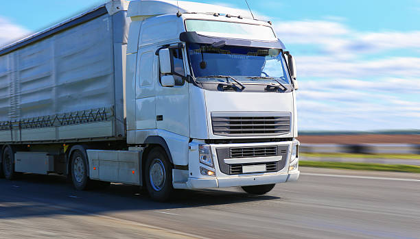 istock truck goes on highway 540399126