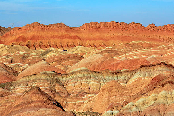 istock bus in the Danxia Landform under blue sky 540399412
