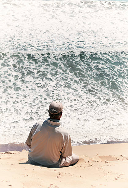 istock Man overlooking the ocean in Sandwich Harbour,Namibia 540401746