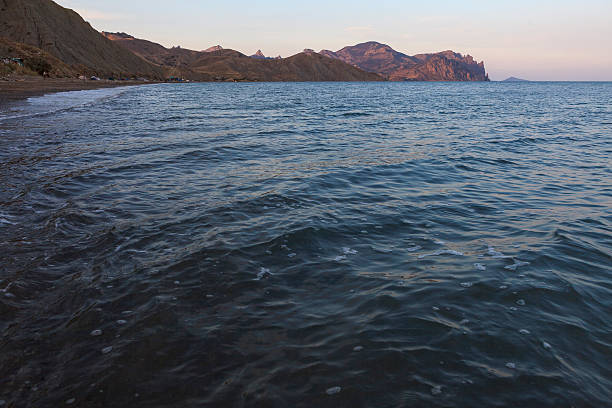 istock Crimea seascape at sunset with the mountains and the beach 540403280