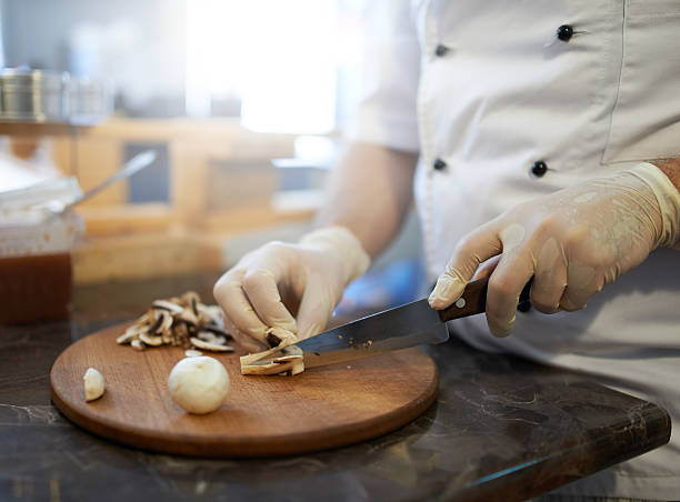istock grinding  mushrooms with knife 540404526
