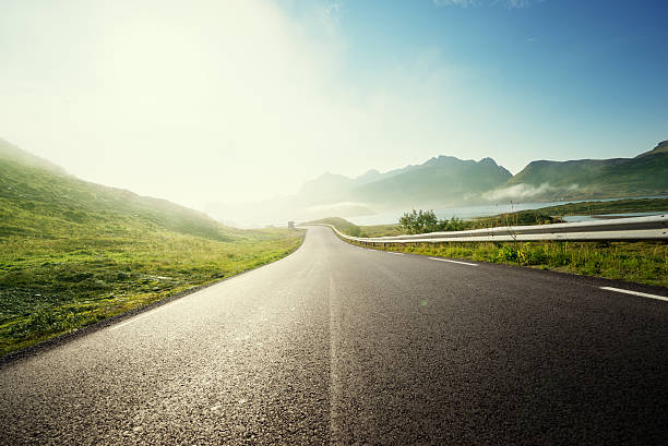 istock road in mountain, Lofoten islands, Norway 540404862