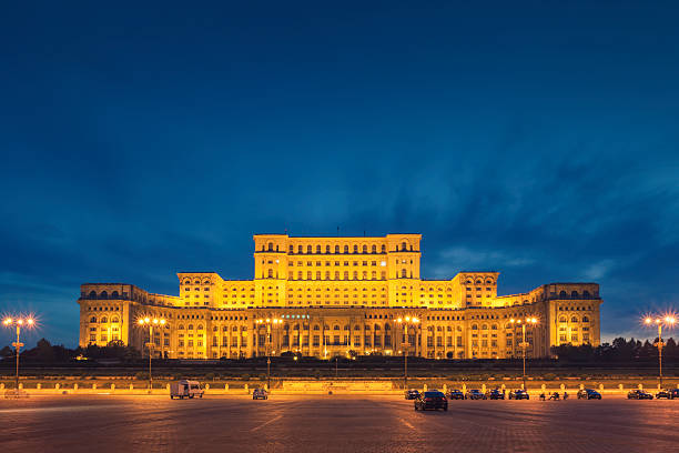 Bucharest parliament building Evening view of the Palace of the Parliament, also known as the People's House, the seat of the Parliament of Romania. The building was completed in 1997 and is the third largest building in the world. bucharest photos stock pictures, royalty-free photos & images