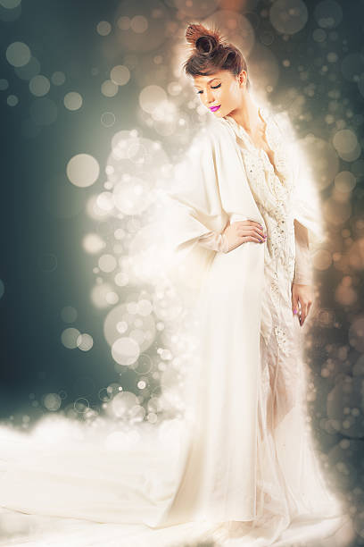 istock Beauty fashion model dressed in white carnival dress for party 540489442