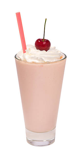 istock cherry milkshake with whipped cream isolated 540491286
