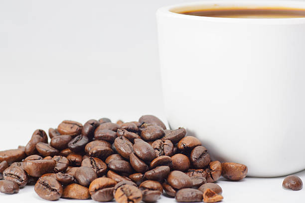 istock Coffee Cup and coffee beans on white background 540491788