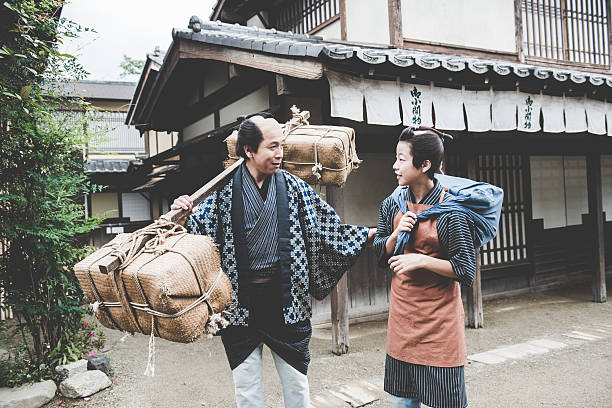 istock Japanese Peasant with Burden and His Son, Edo Period, Kyoto 540496714