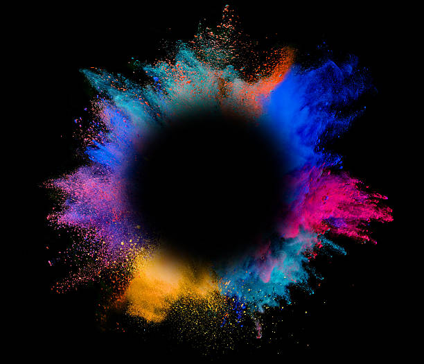 istock Explosion of colored powder on black background 540497698