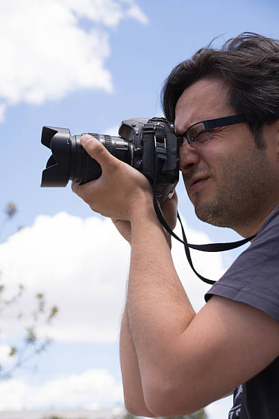 istock Young male photographer 540497712