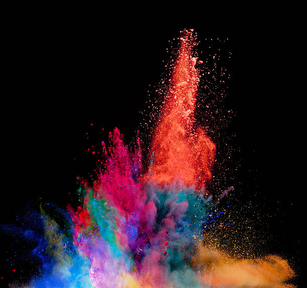 istock Explosion of colored powder on black background 540498082