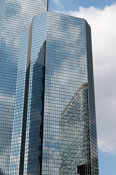 istock Skyscrapers from ground view with blue sky visible 540500196
