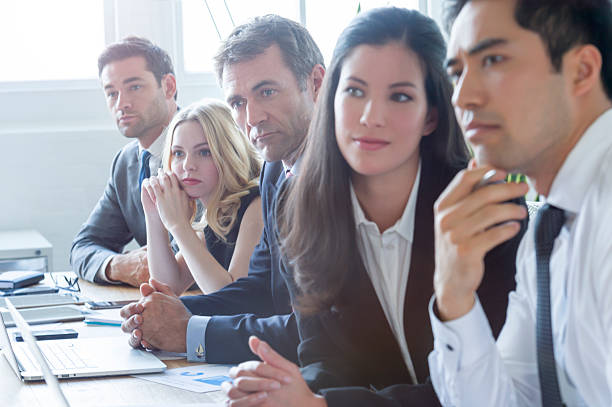 istock Group of multi ethnic business people listening. 540501642