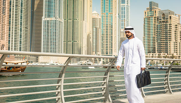 istock sheik twalking on the marina 540503500