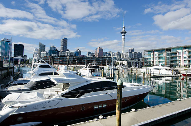 Auckland, New Zealand - June 02, 2013: Yachts mooring at Auckland Viaduct Harbor Basin on June 02, 2013. It's a former commercial harbor turned into a development of mostly upscale apartments, office space and restaurants.