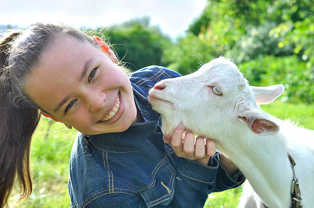 istock Girl with goat 540504292