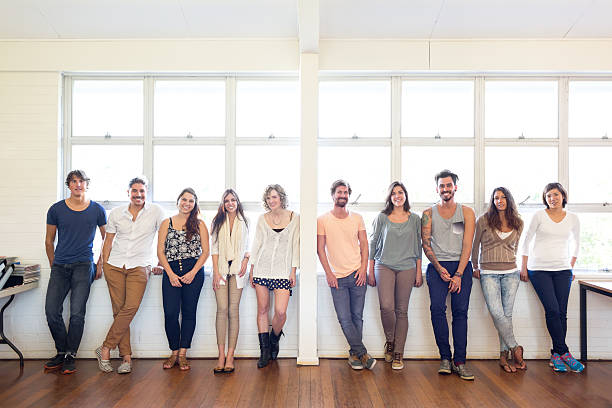 istock Group of Multi-Ethnic Students with Teacher in Classroom 540505404