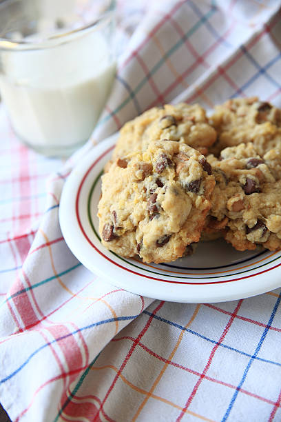 istock Chocolate and butterscotch cookies with milk 540507472