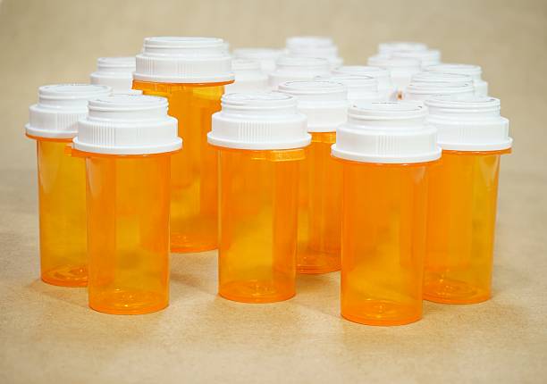 istock Prescription Medicine Bottles With Textured Background 540508602