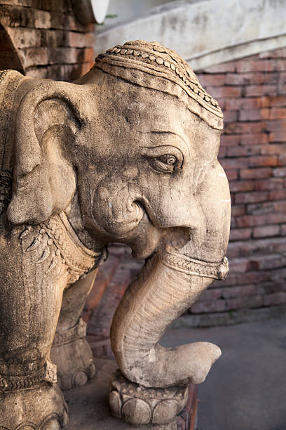 istock Stone decorated elephant head sculpture close-up 540510286